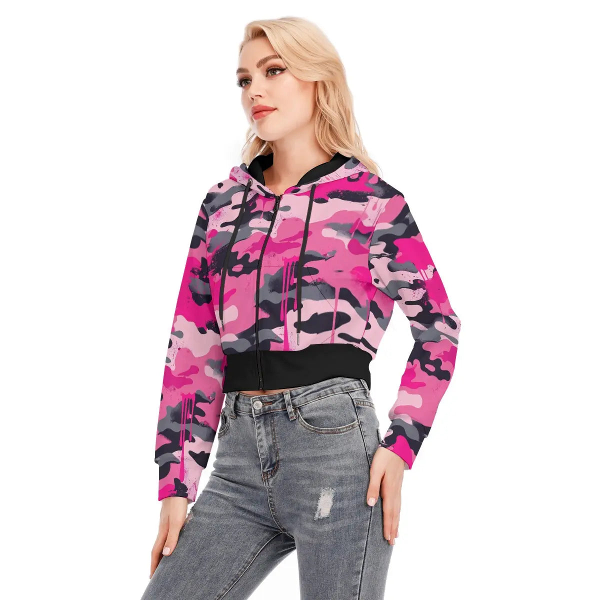 Model wearing pink camo cropped jacket with zipper and long sleeves, made from scuba fabric, perfect for casual outfits and jeans.