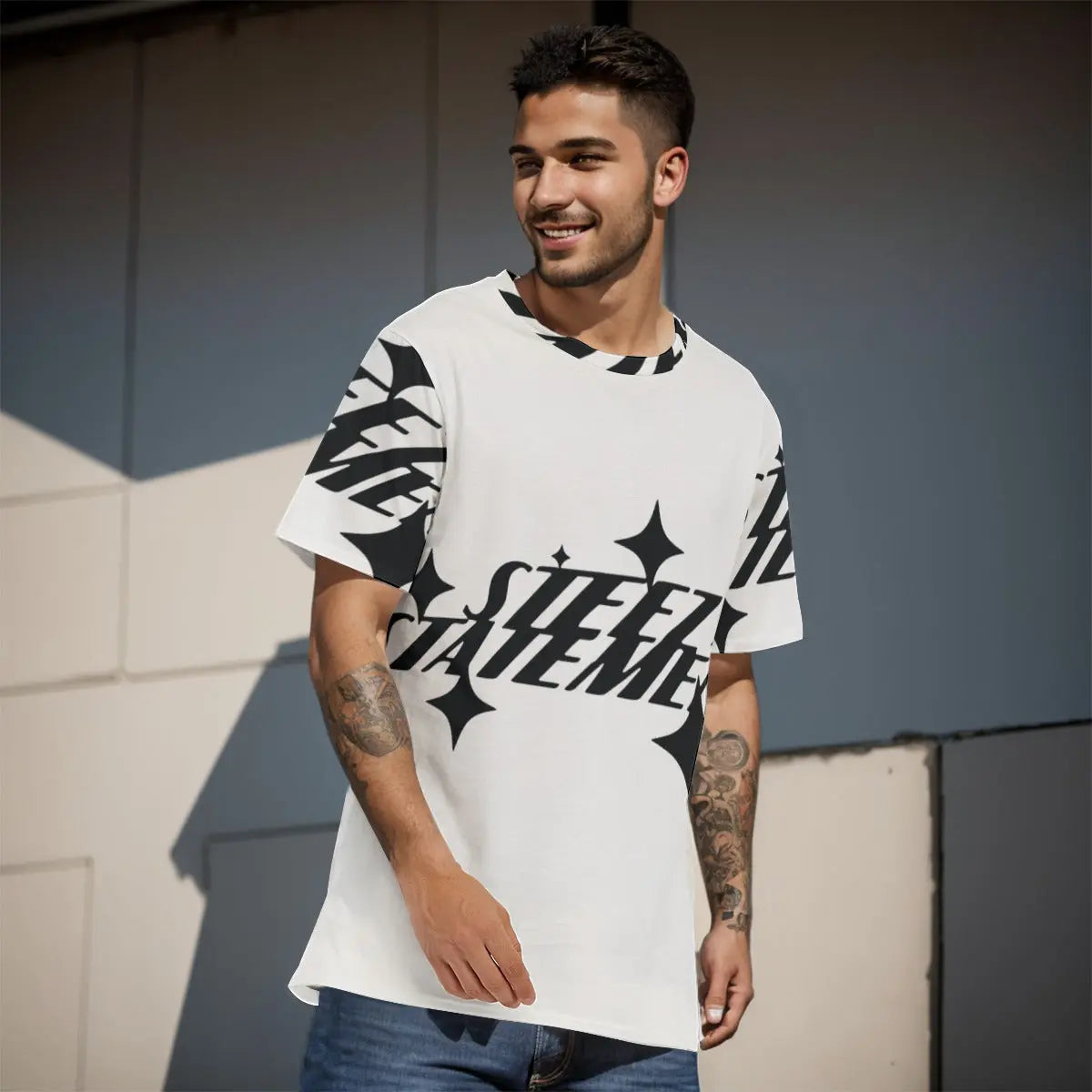Smiling man wearing a stylish men's cotton T-shirt with bold graphic design, ideal for casual wear.