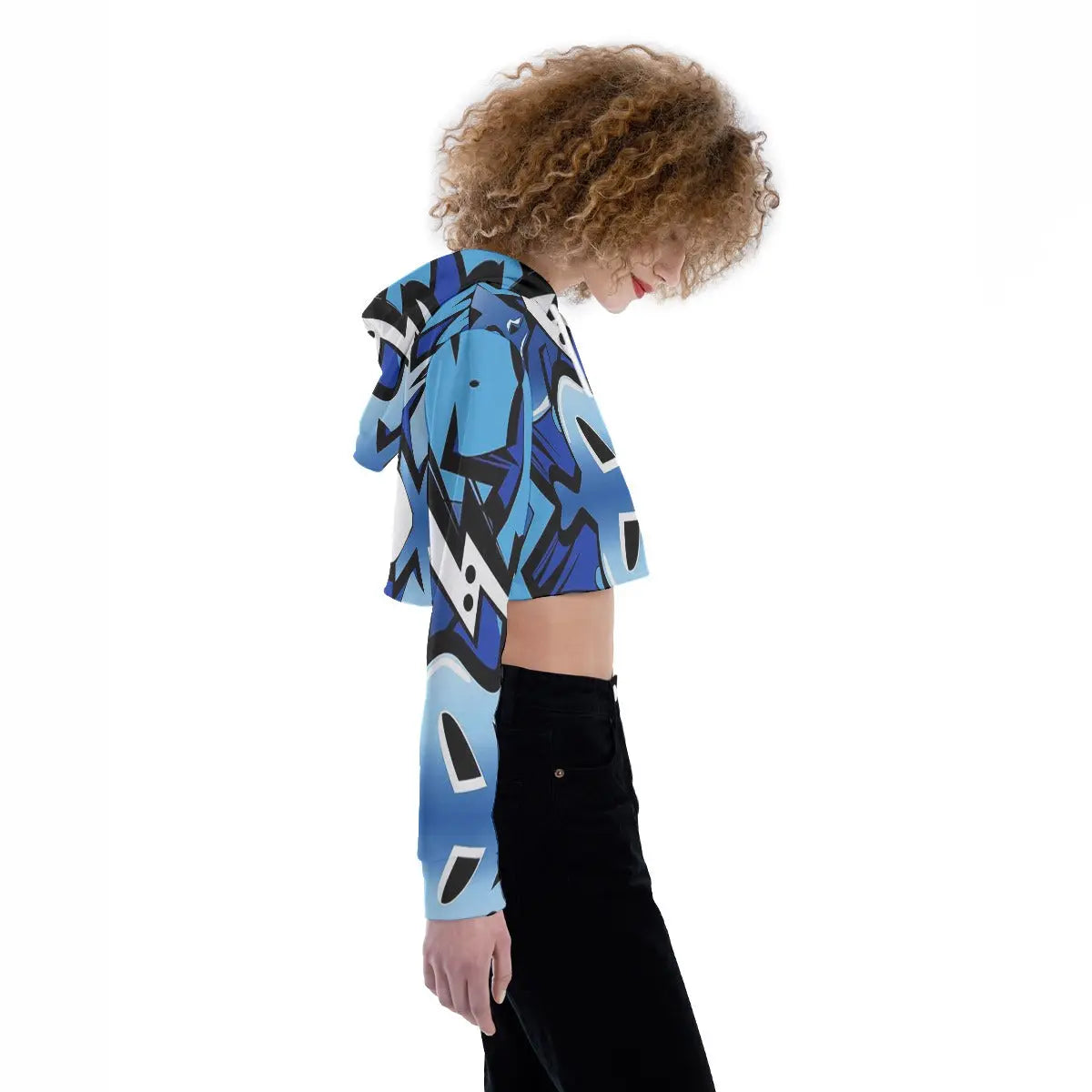 Side view of woman wearing a blue patterned cropped hoodie with a drop shoulder design, suitable for casual wear.
