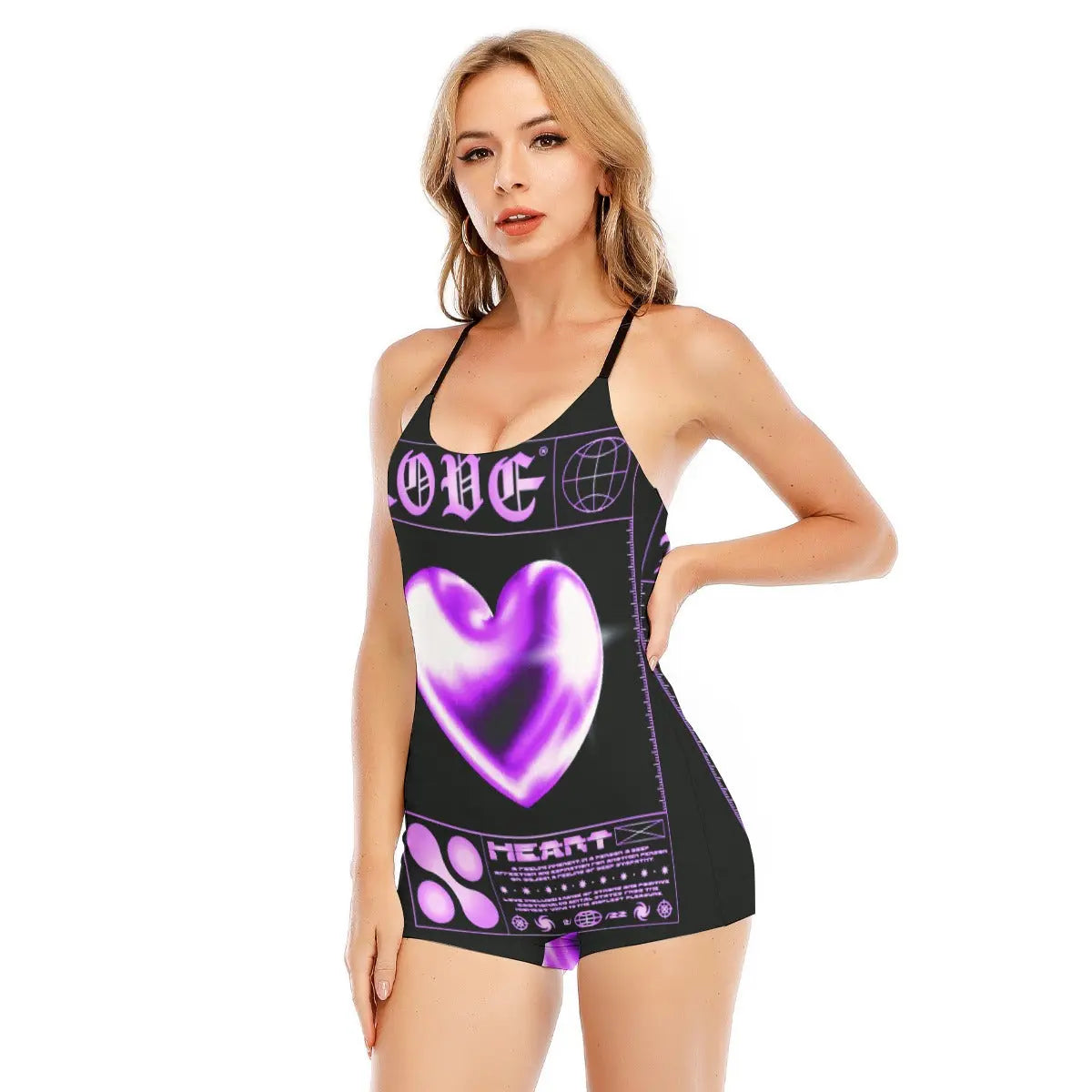 Woman wearing a black romper with purple heart design, featuring spaghetti straps and an open back, ideal for a trendy and sleek look.