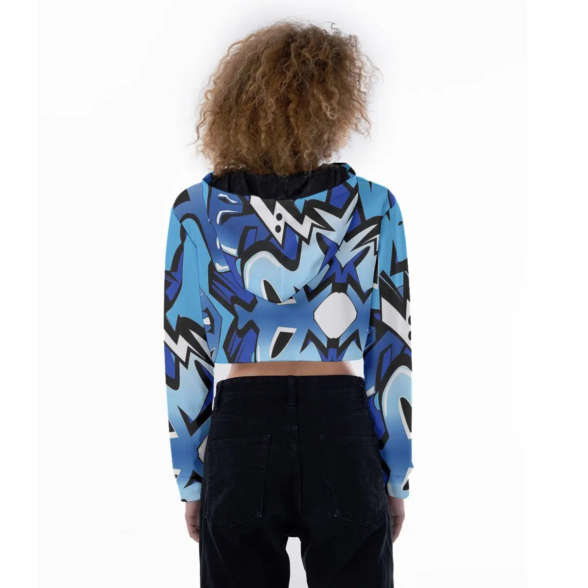 Back view of a woman wearing a blue graffiti print cropped hoodie with a drawstring hood, drop shoulders, and long sleeves.