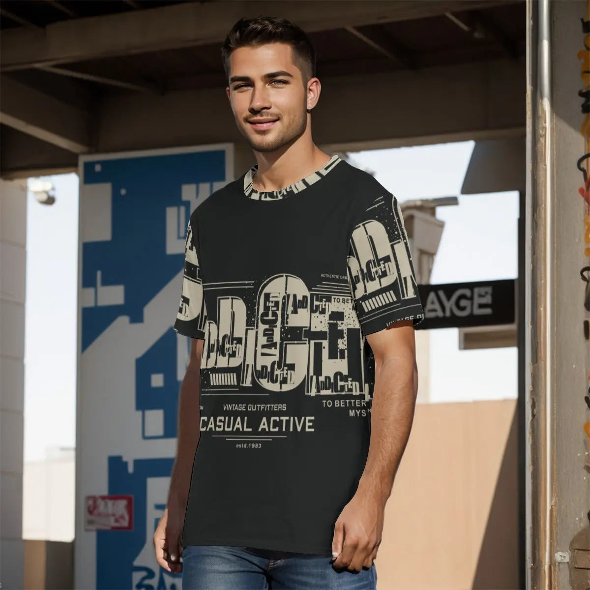 Man wearing a black graphic men's cotton T-shirt with city design, featuring a round neck and regular fit, standing outdoors.
