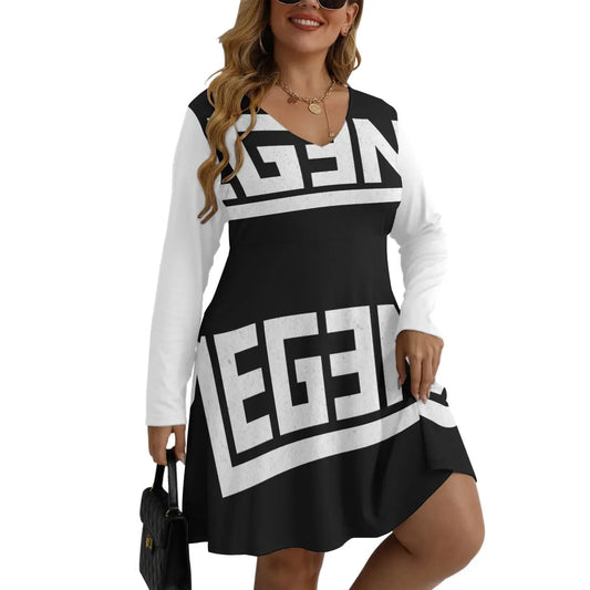 Woman wearing black and white Bell Dress with bold text design, featuring V-neck and long sleeves, perfect for layering.