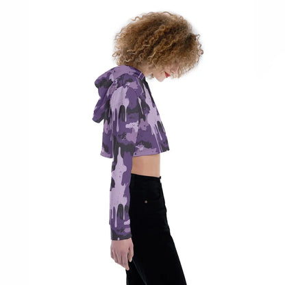Side view of a model wearing a purple camo cropped hoodie with drop shoulder design, suited for casual and sports wear.