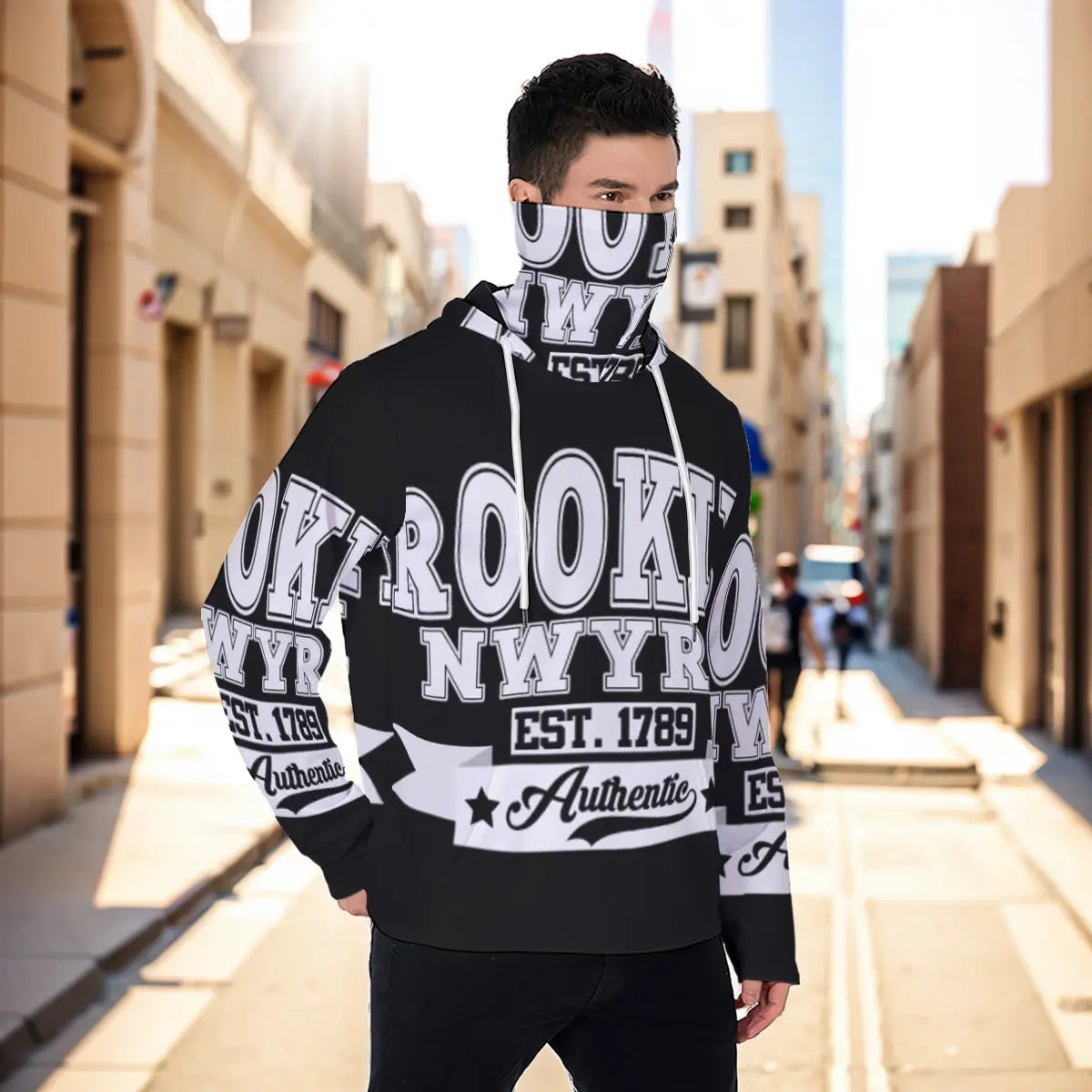 Men's masked hoodie with New York graphic, worn outdoors in urban setting, made from eco-friendly materials for sustainable fashion.