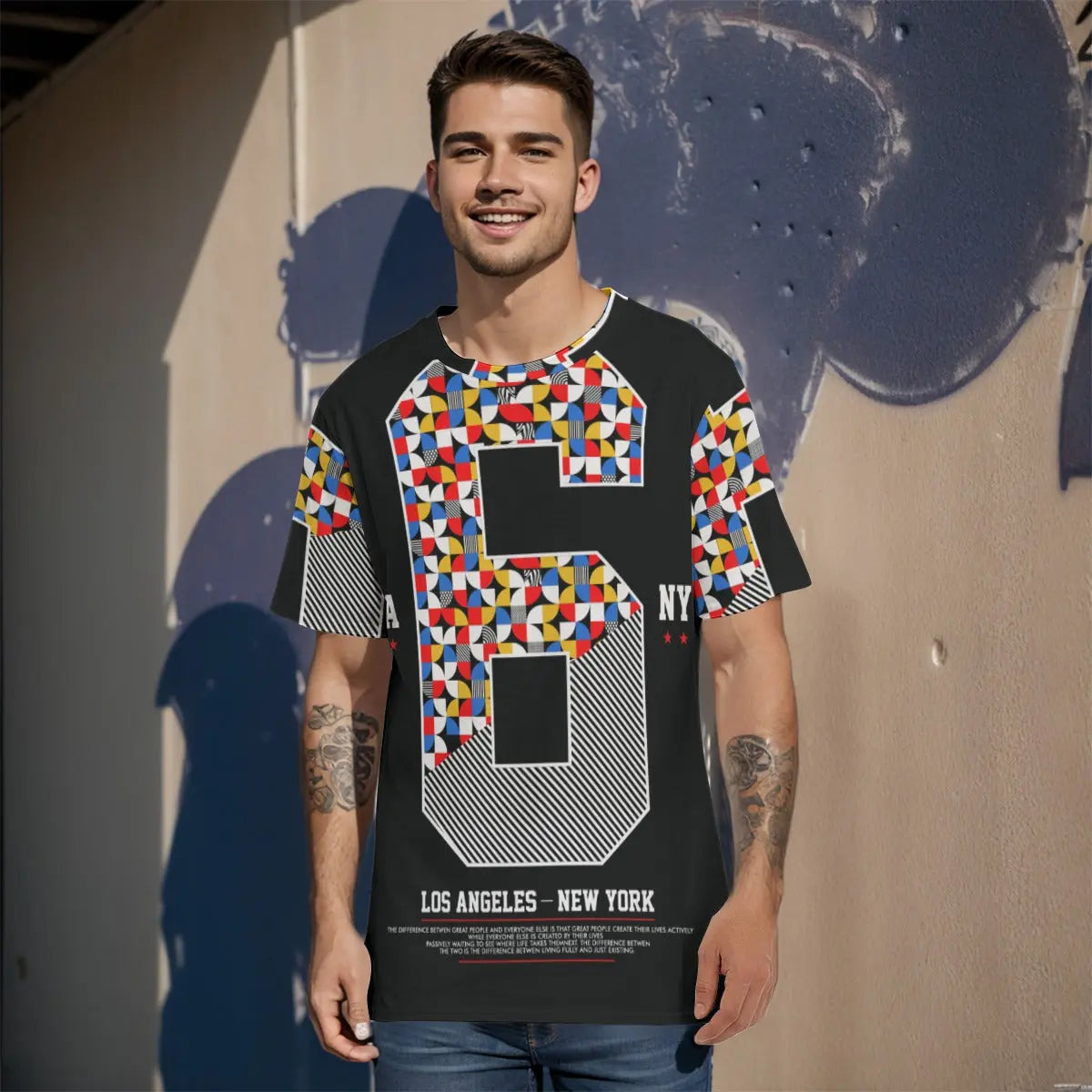 Man wearing a colorful geometric graphic T-shirt outdoors
