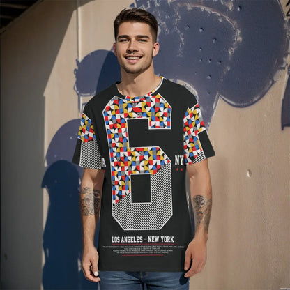 Man wearing a colorful geometric graphic T-shirt outdoors