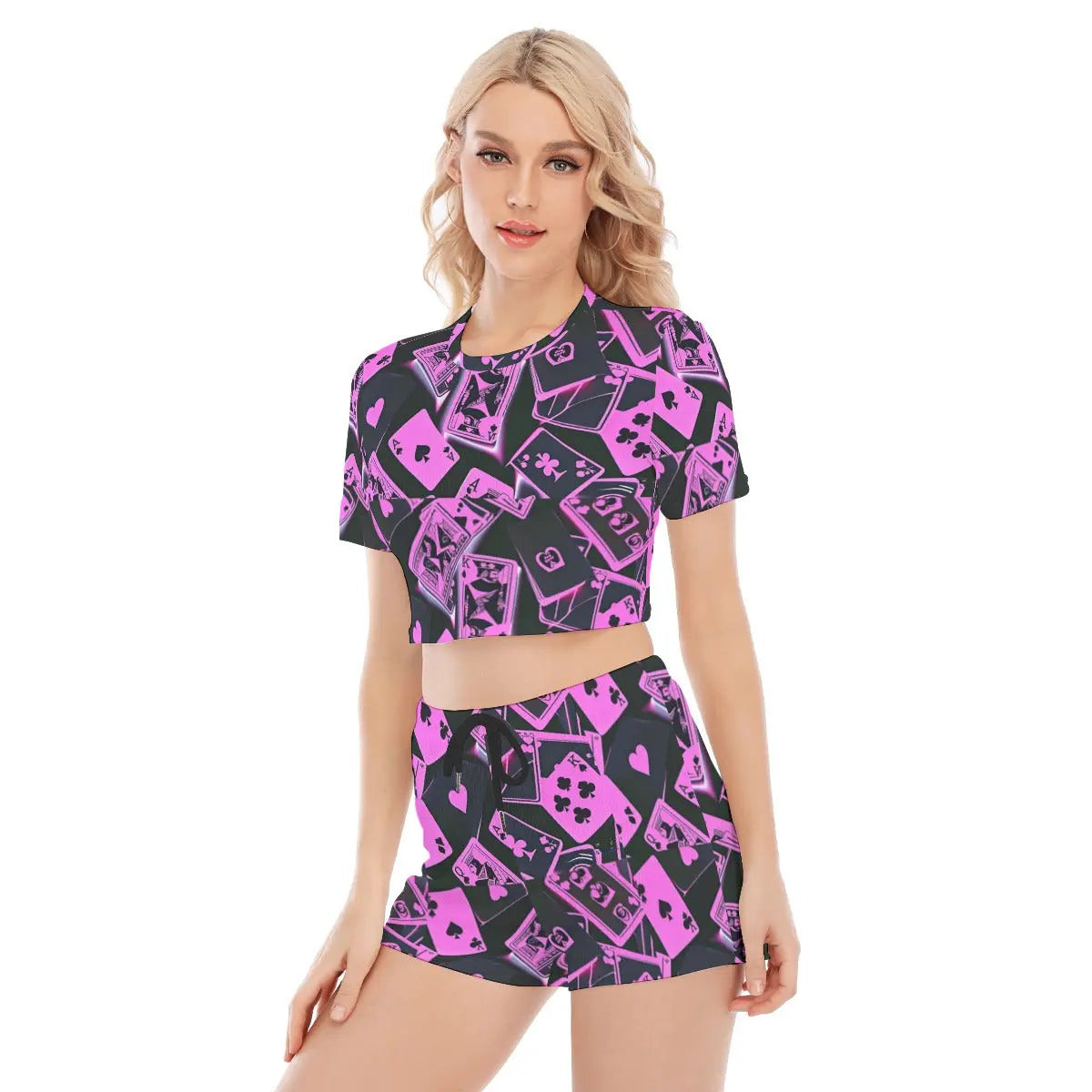 Women's cropped tee set with pink and black geometric print, perfect for casual wear, workouts, or yoga. Made of polyester and spandex.