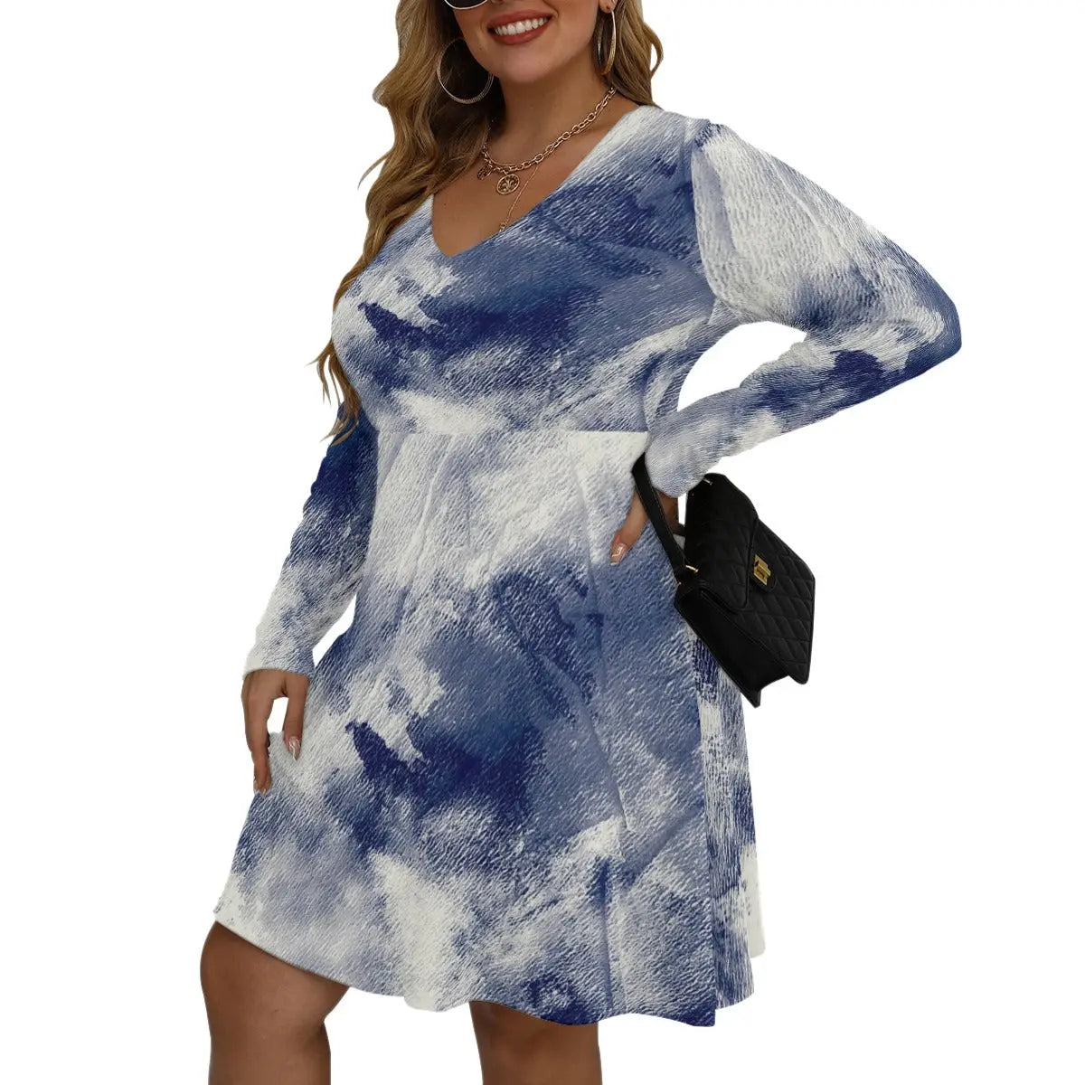 Woman wearing a blue and white patterned Bell Dress, featuring a V-neck and long sleeves, crafted from soft microfiber for comfort.
