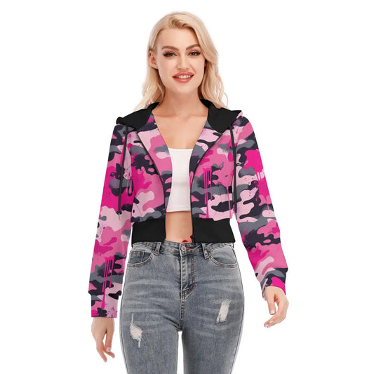 Woman wearing a pink camo cropped jacket with zipper closure, showcasing long sleeves and a comfortable fit, paired with jeans.