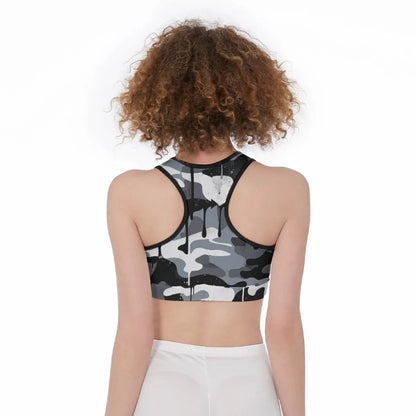 Camo print sports bra with racerback design for support and ventilation, worn by a model showcasing its comfort and performance.
