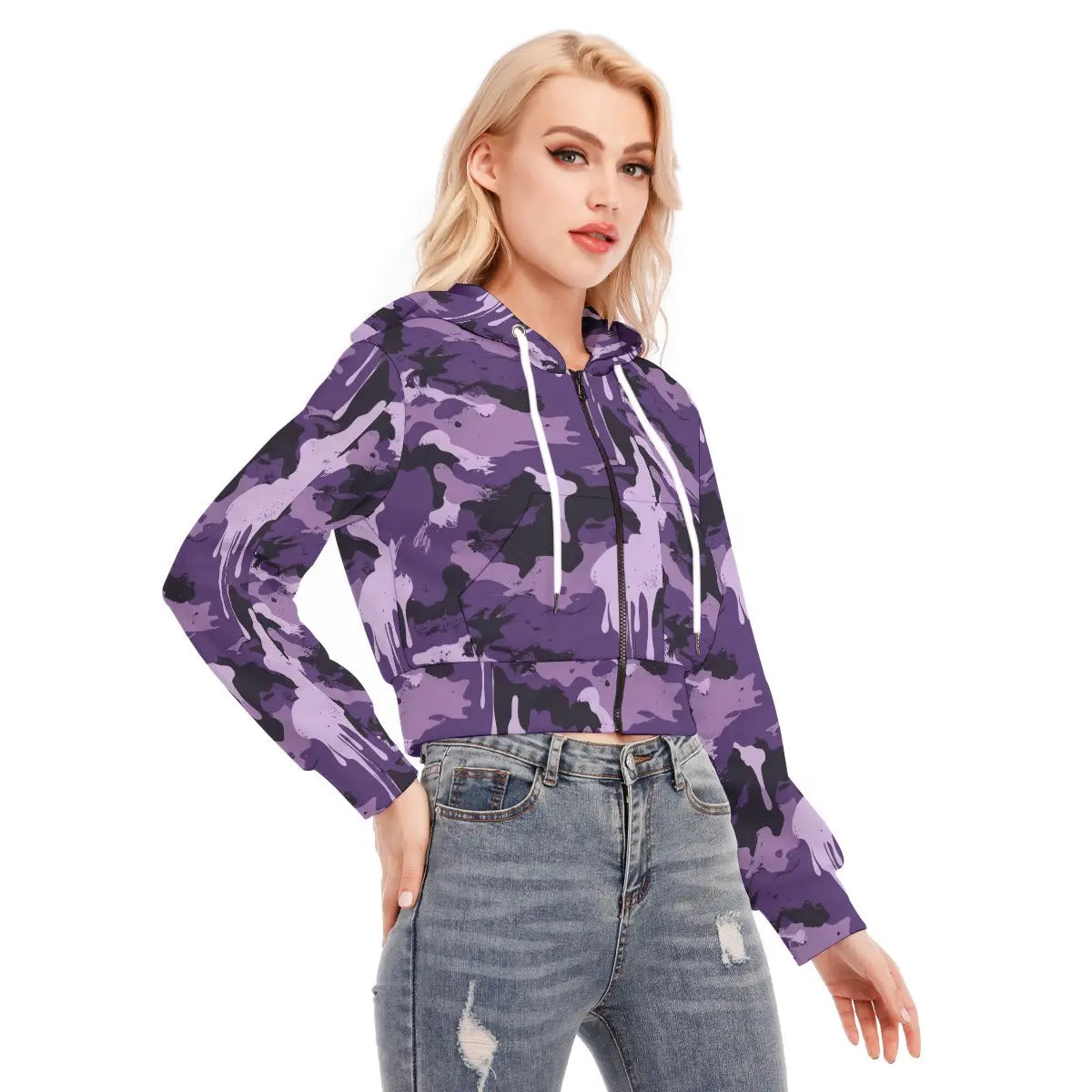 Woman wearing a purple camo cropped jacket with jeans, showcasing the stylish design and comfortable fit.